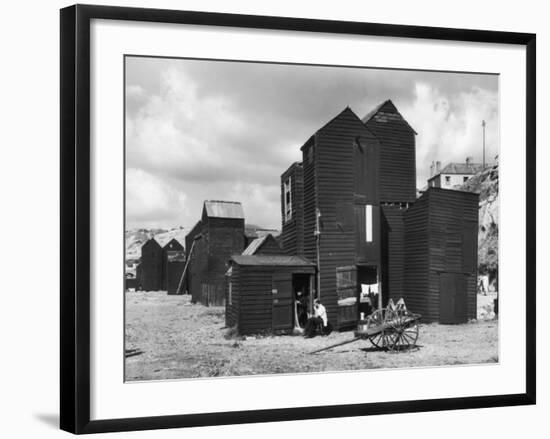 Clustered on the Shingle of the Old Town of Hastings Sussex are These Tall Black Huts-Fred Musto-Framed Photographic Print