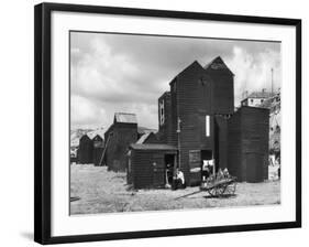 Clustered on the Shingle of the Old Town of Hastings Sussex are These Tall Black Huts-Fred Musto-Framed Photographic Print