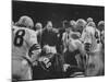 Coach Paul Brown Speaking to the Cleveland Browns Football Team from the Middle of the Huddle-null-Mounted Premium Photographic Print