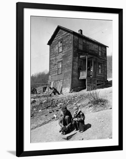 Coal Miner's Boys Playing with Puppy Outside Ramshackle, Two Story House in Dreary Mining Town-Alfred Eisenstaedt-Framed Photographic Print