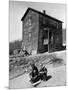 Coal Miner's Boys Playing with Puppy Outside Ramshackle, Two Story House in Dreary Mining Town-Alfred Eisenstaedt-Mounted Photographic Print