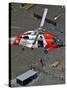 Coast Guard Rescues One from Roof Top of Home, Floodwaters from Hurricane Katrina Cover the Streets-null-Stretched Canvas