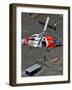 Coast Guard Rescues One from Roof Top of Home, Floodwaters from Hurricane Katrina Cover the Streets-null-Framed Photographic Print