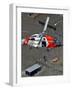 Coast Guard Rescues One from Roof Top of Home, Floodwaters from Hurricane Katrina Cover the Streets-null-Framed Photographic Print