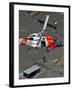 Coast Guard Rescues One from Roof Top of Home, Floodwaters from Hurricane Katrina Cover the Streets-null-Framed Photographic Print