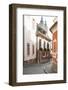 Cobblestone Street and Narrow Buildings with Church Towers in Background, Eger, Hungary-Kimberly Walker-Framed Photographic Print