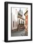 Cobblestone Street and Narrow Buildings with Church Towers in Background, Eger, Hungary-Kimberly Walker-Framed Photographic Print
