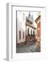 Cobblestone Street and Narrow Buildings with Church Towers in Background, Eger, Hungary-Kimberly Walker-Framed Photographic Print