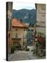 Cobblestone Street Down to Waterfront, Lake Orta, Orta, Italy-Lisa S. Engelbrecht-Stretched Canvas