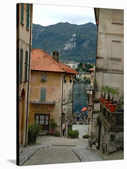 Cobblestone Street Down to Waterfront, Lake Orta, Orta, Italy-Lisa S. Engelbrecht-Stretched Canvas