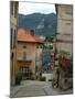 Cobblestone Street Down to Waterfront, Lake Orta, Orta, Italy-Lisa S. Engelbrecht-Mounted Photographic Print