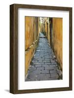 Cobblestones and yellow walls in alleyway, Hoi An, Vietnam-David Wall-Framed Photographic Print