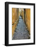 Cobblestones and yellow walls in alleyway, Hoi An, Vietnam-David Wall-Framed Photographic Print