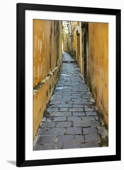 Cobblestones and yellow walls in alleyway, Hoi An, Vietnam-David Wall-Framed Photographic Print