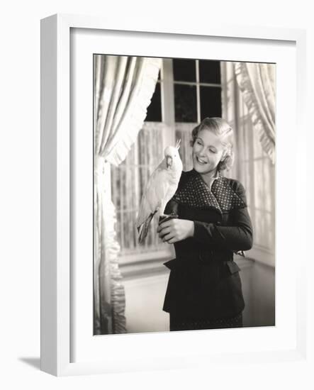 Cockatoo Perched on Woman's Hand-null-Framed Photo