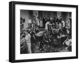 Cocktail Party in the Home of Mrs. R. Craig Montgomery-Yale Joel-Framed Photographic Print