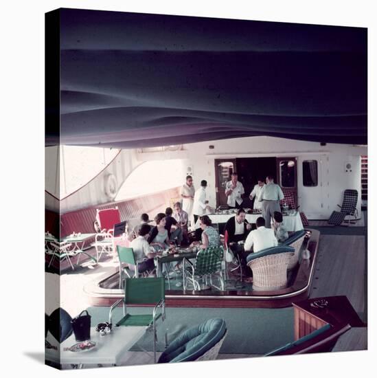 Cocktail Party on Deck of Famous Yacht 'Christina O' Owned by Shipping Magnate Aristotle Onassis-Dmitri Kessel-Stretched Canvas