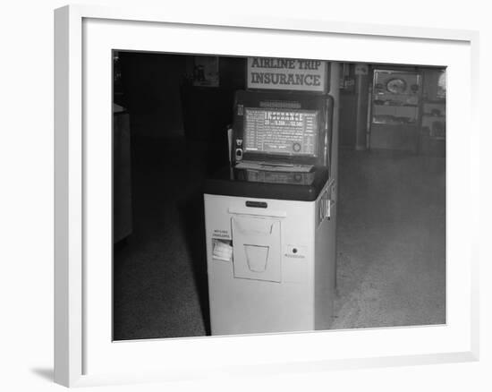 Coin Operated Airline Insurance Machine-null-Framed Photographic Print