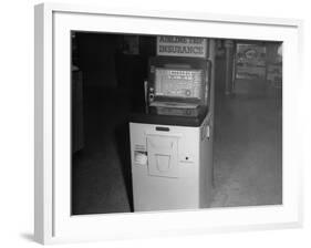 Coin Operated Airline Insurance Machine-null-Framed Photographic Print