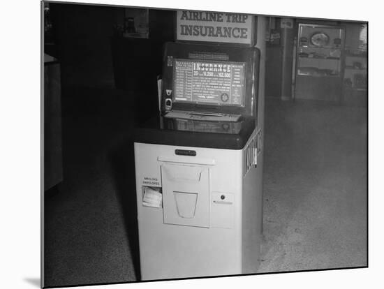 Coin Operated Airline Insurance Machine-null-Mounted Photographic Print