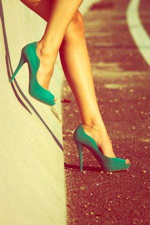 Woman Tan Legs In High Heel Green Shoes Outdoor Shot Summer Day