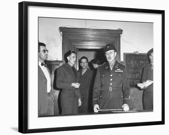 Col. Burton Andrus Announcing Suicide of Hermann Goering During Trial of German War Criminals-null-Framed Photographic Print