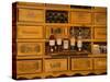 Collection of wines and armagnac in the Mano a Mano cafe-bar in Vic-Fezensac, Gers Department, M...-null-Stretched Canvas