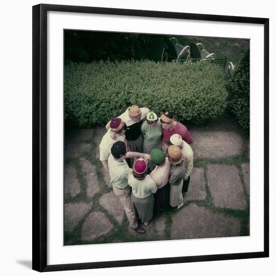 College Men and Woman Flipping a Coin on Purdue Campus, West Lafayette, Indiana 1954-Nina Leen-Framed Photographic Print