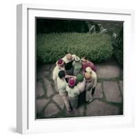 College Men and Woman Flipping a Coin on Purdue Campus, West Lafayette, Indiana 1954-Nina Leen-Framed Photographic Print