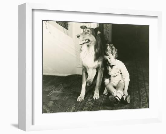 Collie Guards Sleeping Child-null-Framed Photo