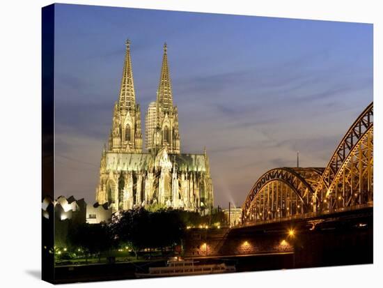 Cologne Cathedral, and Hohenzollern Bridge at Night, North Rhine Westphalia-Yadid Levy-Stretched Canvas