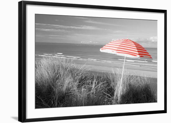 Color Pop, Beach umbrella on the beach, Saunton, North Devon, England, Living Coral-null-Framed Photographic Print