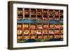 Color wall of books at buddhist monastery in Tengboche, Nepal on the way to Everest Base Camp-David Chang-Framed Photographic Print