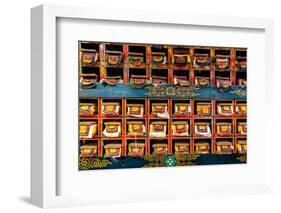 Color wall of books at buddhist monastery in Tengboche, Nepal on the way to Everest Base Camp-David Chang-Framed Photographic Print