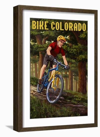 Colorado - Mountain Biker in Trees-Lantern Press-Framed Art Print