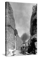 Colorado - Passengers Awaiting Train in Narrow Pass-Lantern Press-Stretched Canvas