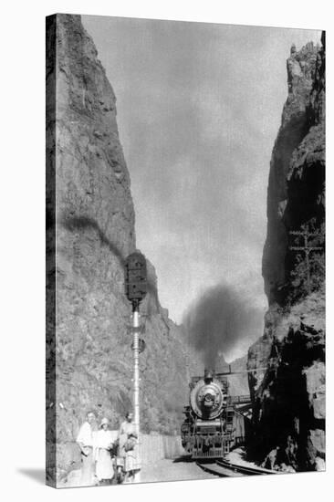 Colorado - Passengers Awaiting Train in Narrow Pass-Lantern Press-Stretched Canvas