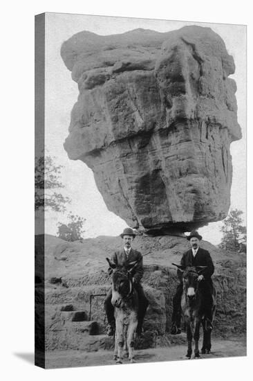 Colorado Springs, CO - Garden of Gods Balanced Rock, Men on Burros-Lantern Press-Stretched Canvas