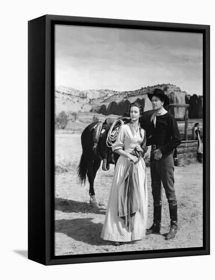 COLORADO TERRITORY, 1949 directed by RAOUL WALSH Dorothy Malone and Joel McCrea (b/w photo)-null-Framed Stretched Canvas
