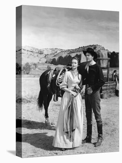 COLORADO TERRITORY, 1949 directed by RAOUL WALSH Dorothy Malone and Joel McCrea (b/w photo)-null-Stretched Canvas