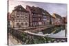 Colored houses reflected in River Lauch at sunset, Petite Venise, Colmar, Haut-Rhin department, Als-Roberto Moiola-Stretched Canvas