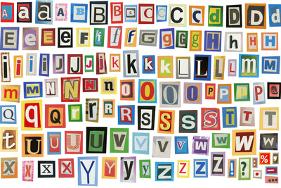 colorful alphabet made of magazine clippings and letters isolated on