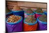 Colorful bags of spices for sale at the Medina Souk. Marrakech, Morocco.-Sergio Pitamitz-Mounted Photographic Print