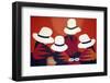 Colorful blanket picturing indigenous women at the market in Otavalo, Ecuador.-Miva Stock-Framed Photographic Print