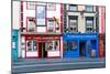 Colorful building fronts of traditional beer pubs in Kilkenny, County Kilkenny, Leinster, Ireland-Logan Brown-Mounted Photographic Print