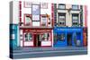 Colorful building fronts of traditional beer pubs in Kilkenny, County Kilkenny, Leinster, Ireland-Logan Brown-Stretched Canvas