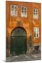 Colorful Building with Bikes Parked Outside, Copenhagen, Denmark-Inger Hogstrom-Mounted Photographic Print