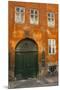 Colorful Building with Bikes Parked Outside, Copenhagen, Denmark-Inger Hogstrom-Mounted Premium Photographic Print