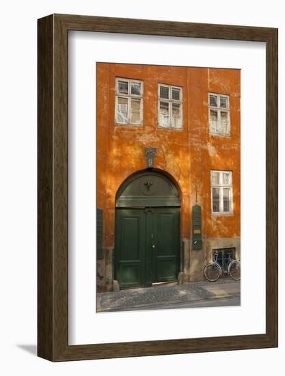 Colorful Building with Bikes Parked Outside, Copenhagen, Denmark-Inger Hogstrom-Framed Photographic Print