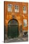 Colorful Building with Bikes Parked Outside, Copenhagen, Denmark-Inger Hogstrom-Stretched Canvas